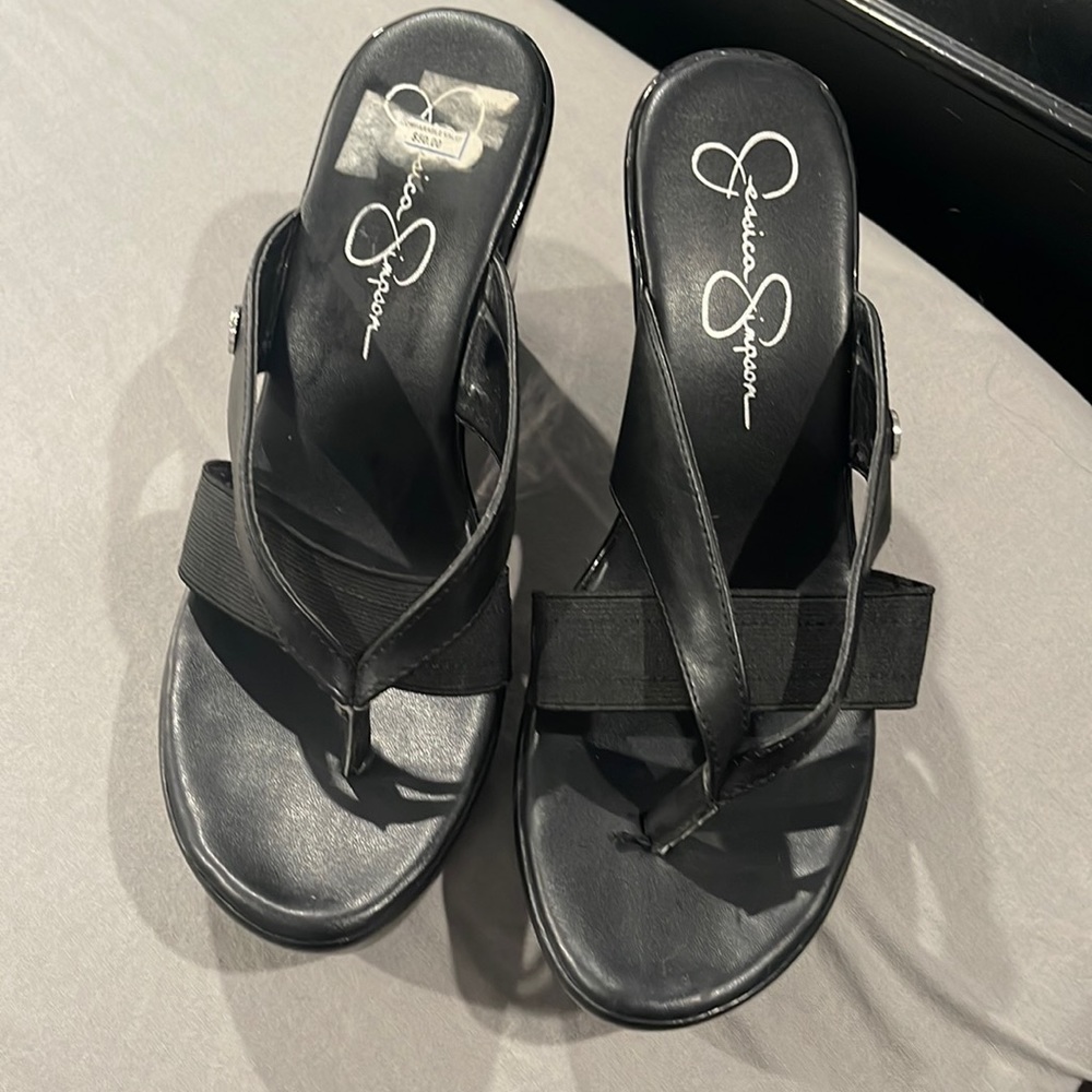 slip on sandals maybe worn once or twice still has the tag with original price